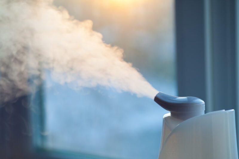 A close up of an air humidifier with steam coming out
