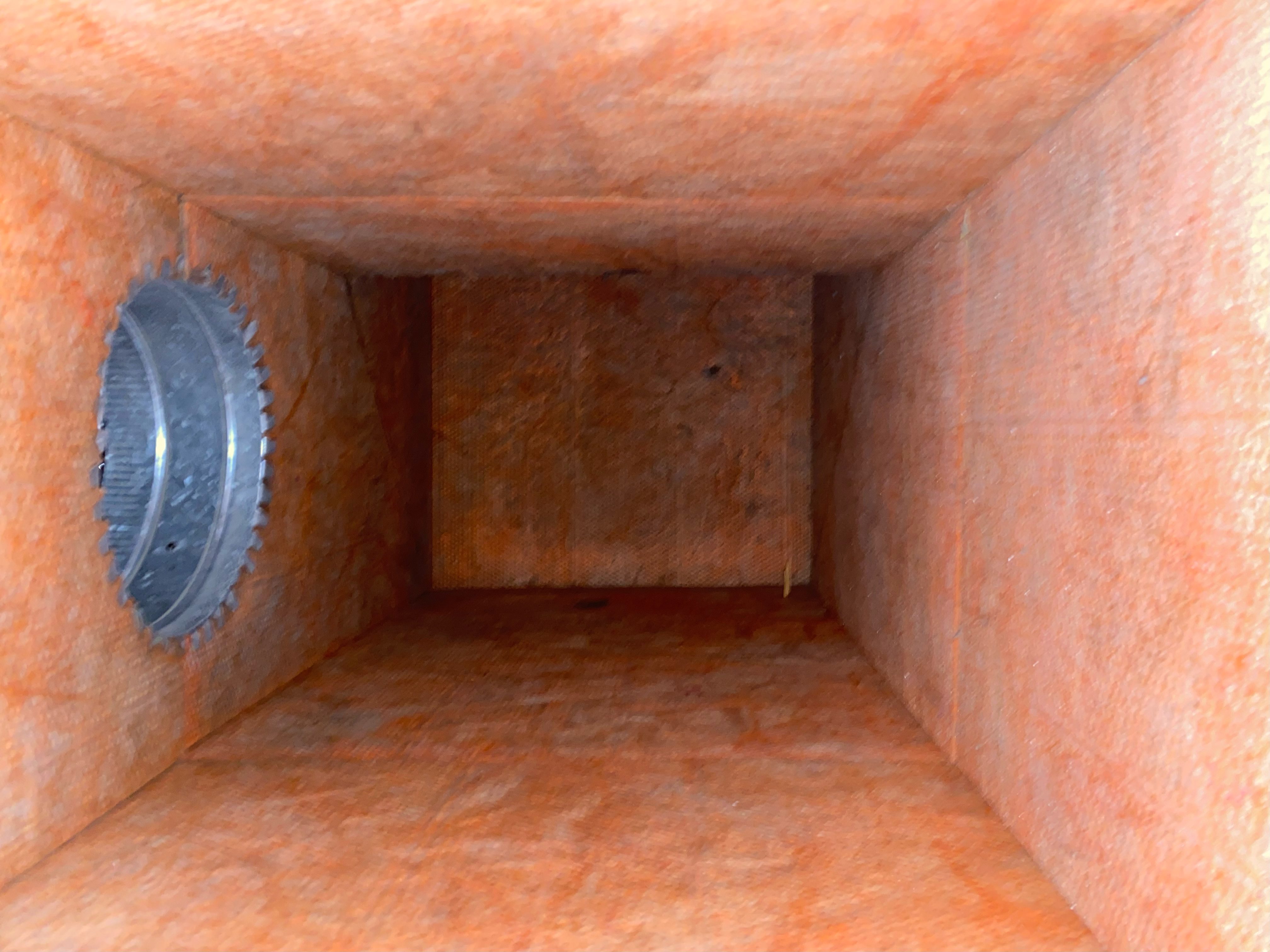A view of the inside of an orange box.